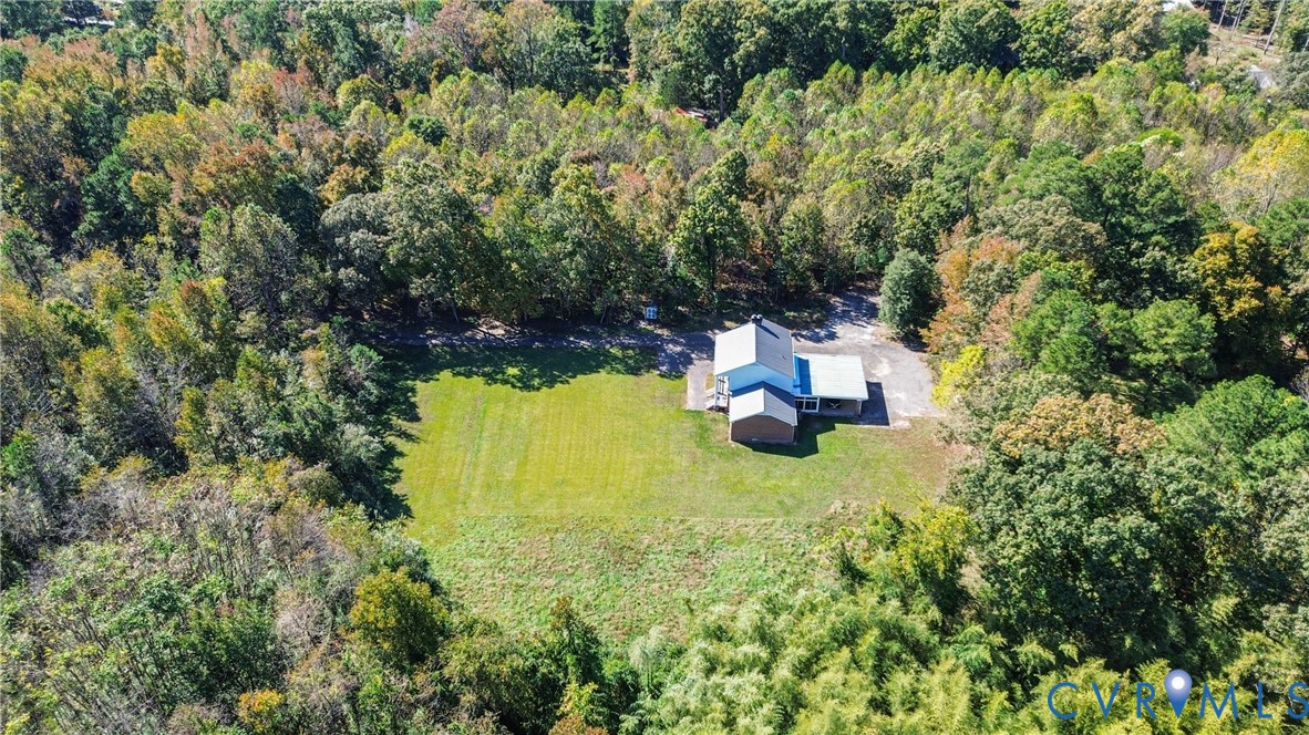 13225 Old Happy Hill Road Chester, VA 23831 - Photo 20 of 24 a building with trees in front of it