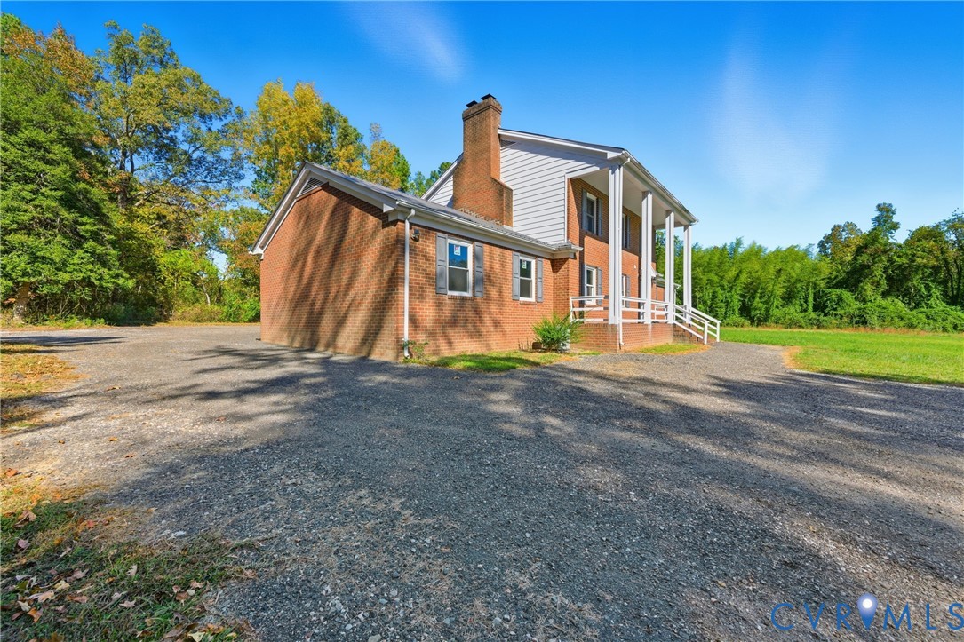13225 Old Happy Hill Road Chester, VA 23831 - Photo 4 of 24 a view of a house with a yard