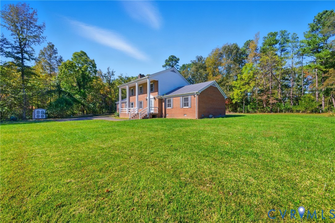 13225 Old Happy Hill Road Chester, VA 23831 - Photo 6 of 24 a view of a house with a yard