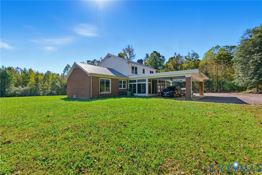 13225 Old Happy Hill Road Chester, VA 23831 - Photo 7 of 24 a front view of house with yard and green space