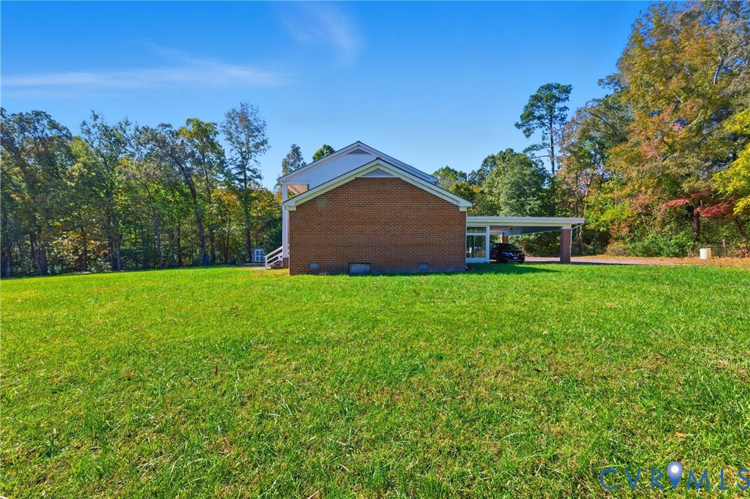 13225 Old Happy Hill Road Chester, VA 23831 - Photo 8 of 24 a view of a house with a yard