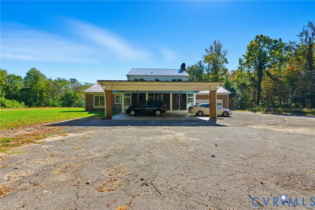 13225 Old Happy Hill Road Chester, VA 23831 - Photo 9 of 24 front view of a house with a yard