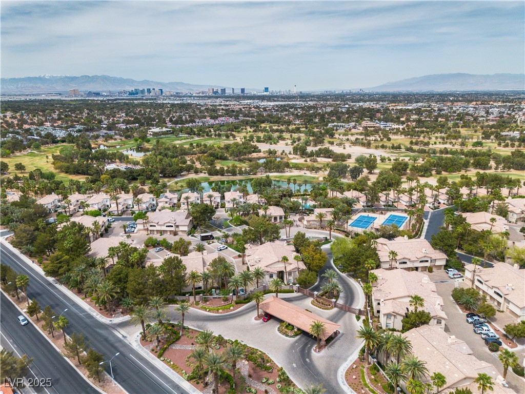 2050 West Warm Springs Road, Unit 1822 Henderson, NV 89014 - Photo 37 of 55 Birds eye view of property featuring a residential view and a mountain view
