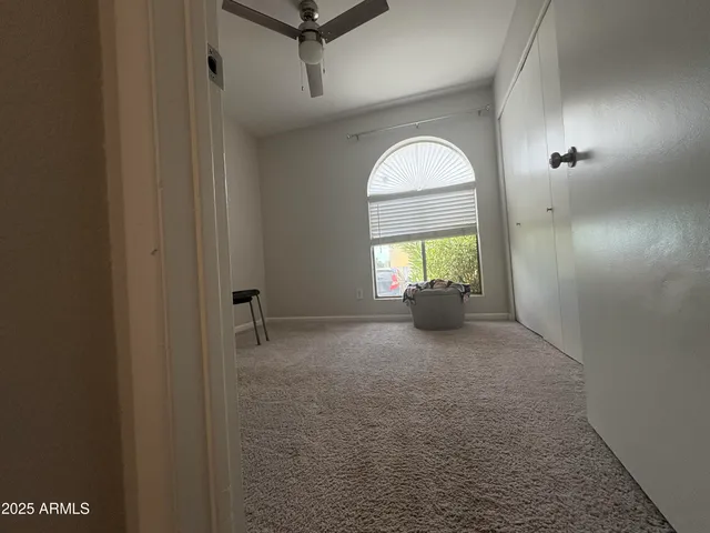 a view of a livingroom with a window