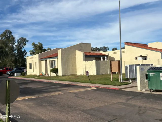 a view of a house with a street