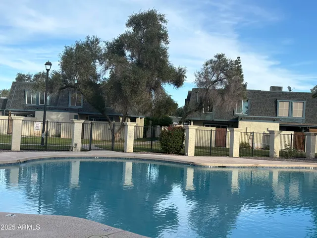 a view of houses with a street