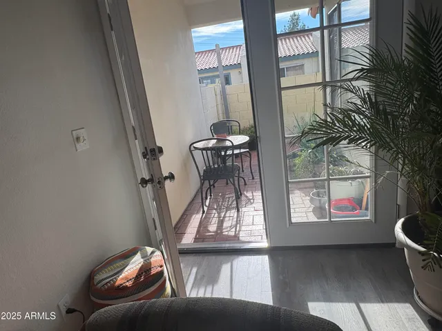 a living room with furniture and a window