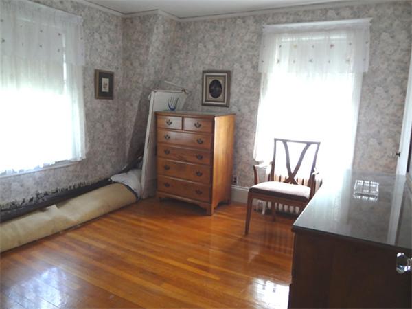 55 Cedar Road Medford, MA 02155 - Photo 17 of 20 a living room with furniture and a wooden floor