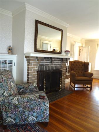 55 Cedar Road Medford, MA 02155 - Photo 4 of 20 a living room with furniture and a fireplace