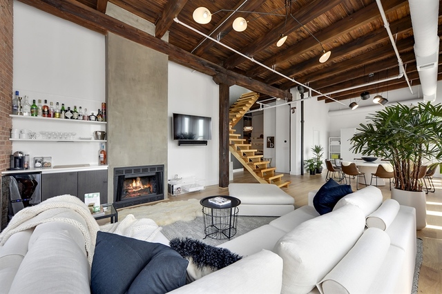 Undisclosed Address Chicago, IL 60607 - Photo 4 of 19 a living room with furniture and a fireplace