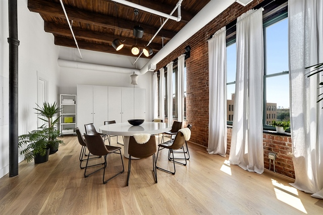 Undisclosed Address Chicago, IL 60607 - Photo 8 of 19 a view of a dining room with furniture and window