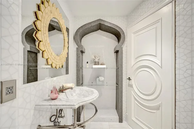 a view of entryway with a rug and a chandelier