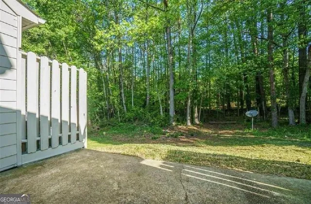 a view of backyard with green space