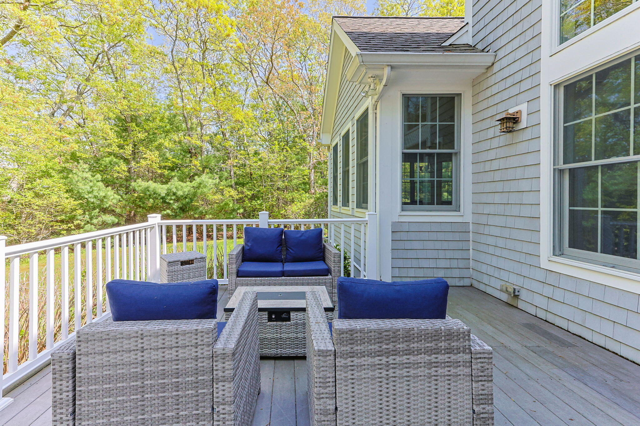 17 Payamps Road Mashpee, MA 02649 - Photo 59 of 72 a view of a patio with a table and chairs