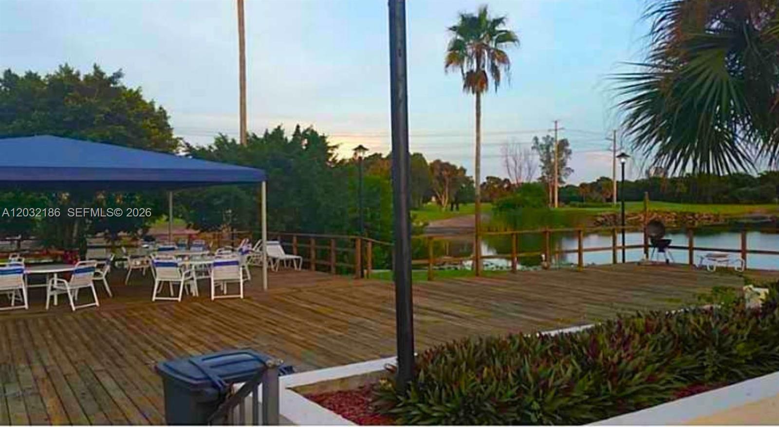 4164 Inverrary Drive, Unit 204 Lauderhill, FL 33319 - Photo 27 of 28 a view of a table and chairs in patio