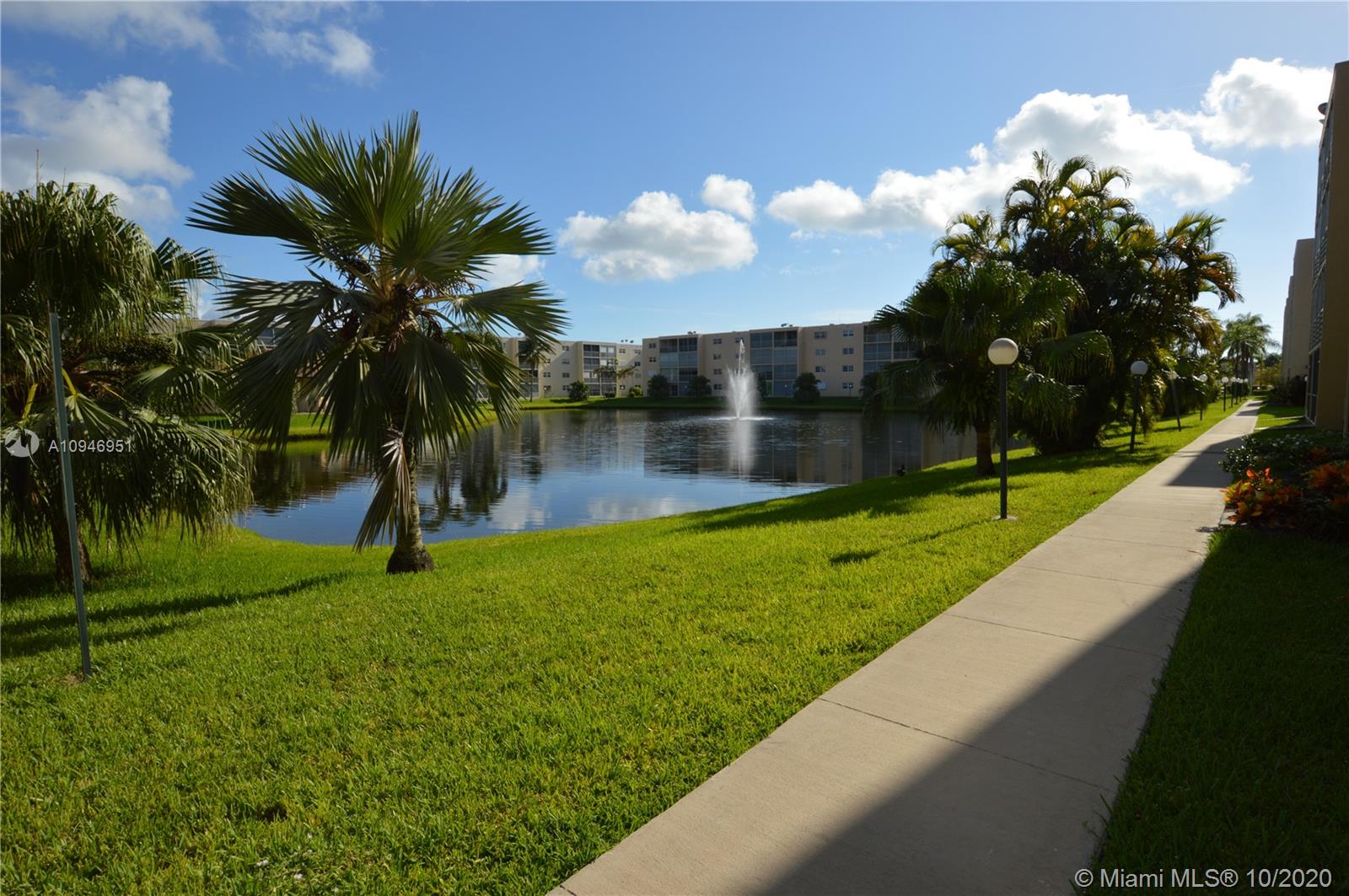 Beautifully maintained lake with walkway around the entire lake for your walks