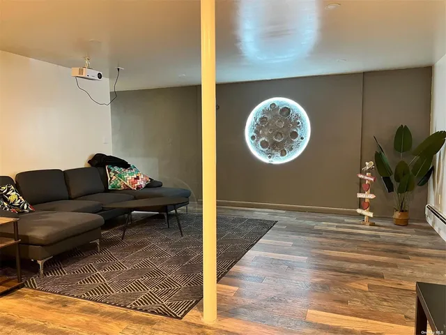 a living room with couch and a table