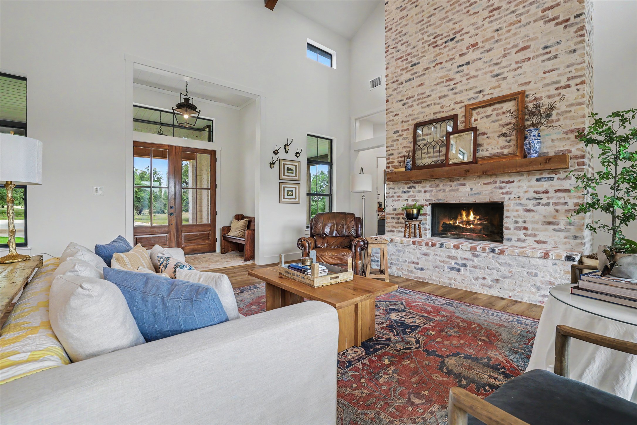 7670 Shiny Top Ranch Lane Salado, TX 76571 - Photo 8 of 40 a living room with furniture and a fireplace