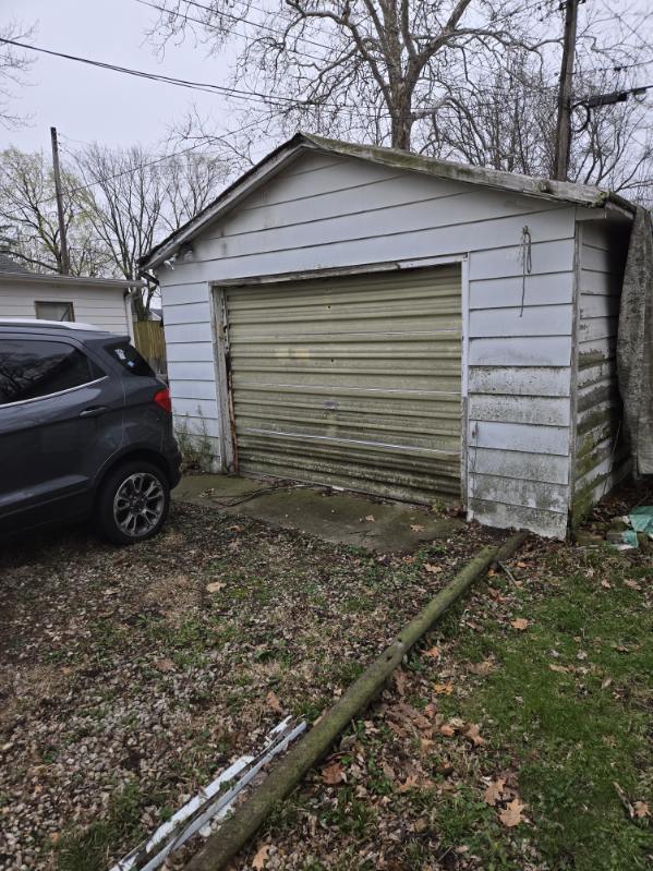 1505 West Columbia Avenue Champaign, IL 61821 - Photo 7 of 8 a view of a house that has a small car parked on the road
