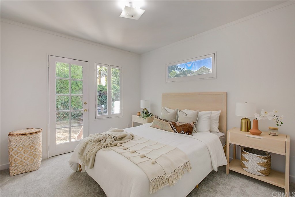 1126 Scofield Drive Glendale, CA 91205 - Photo 23 of 49 a bedroom with a bed and a window