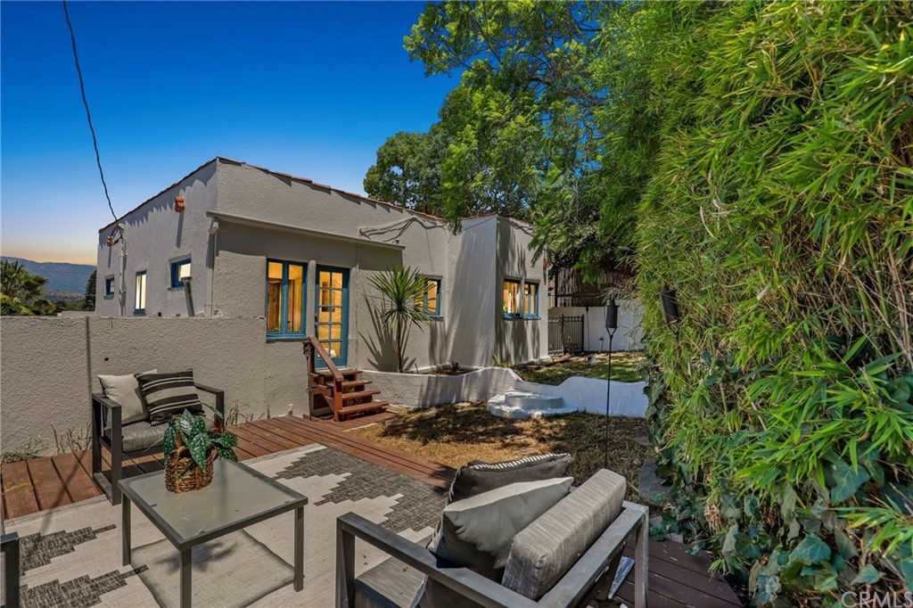 1126 Scofield Drive Glendale, CA 91205 - Photo 47 of 49 a view of a house with backyard water fountain and sitting area