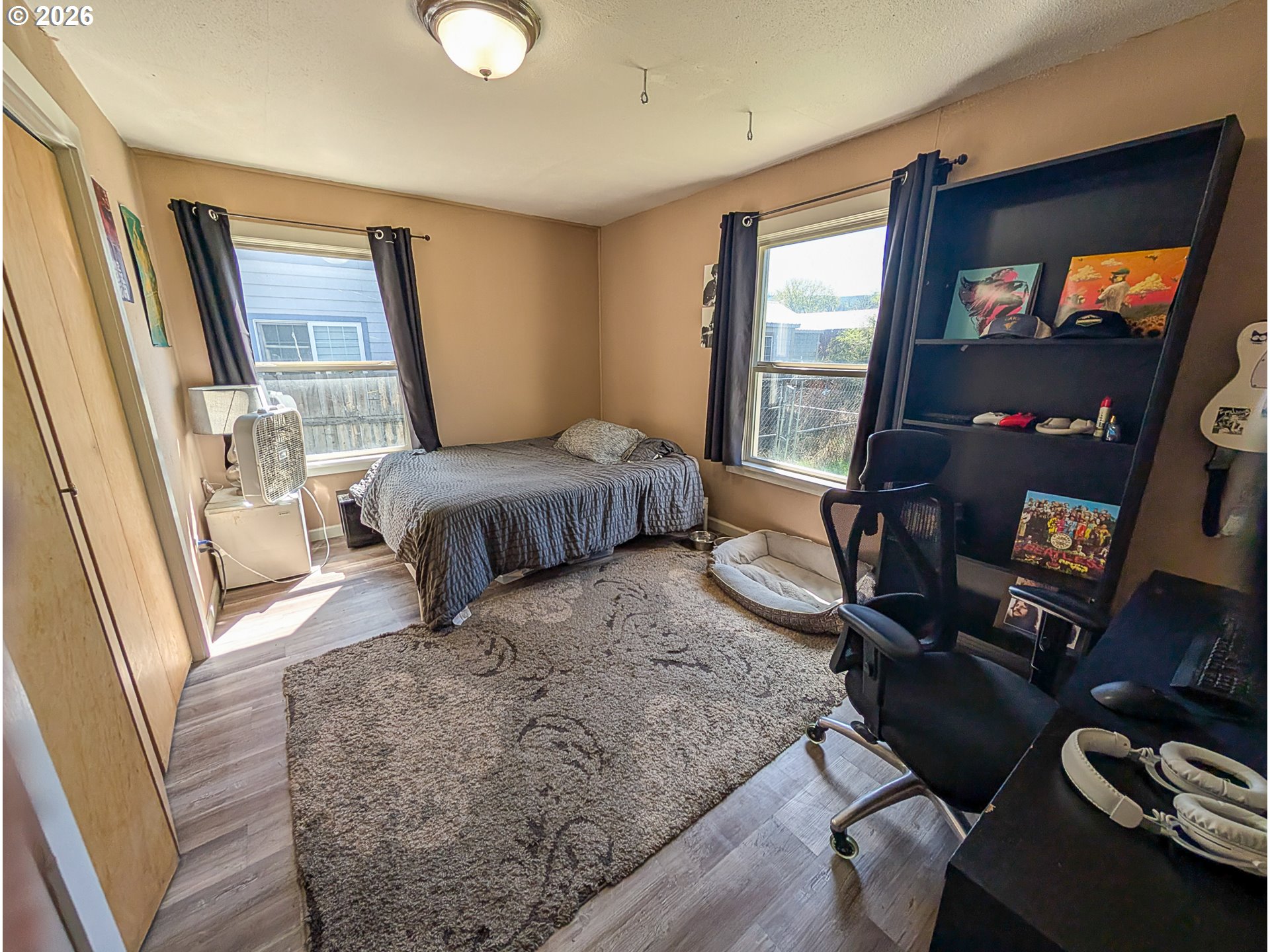 2802 North Spruce Street La Grande, OR 97850 - Photo 11 of 26 a bedroom with furniture and a window
