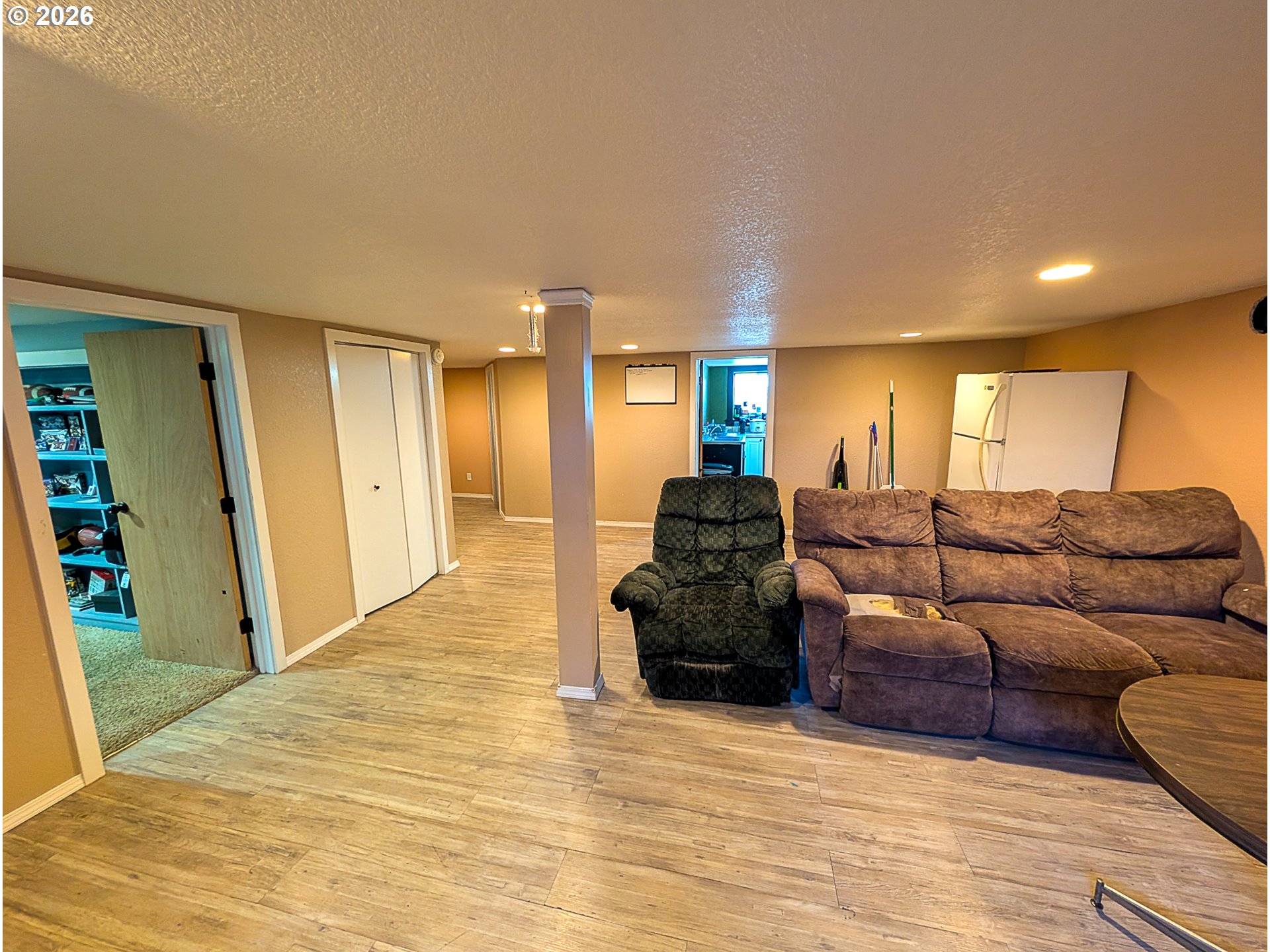 2802 North Spruce Street La Grande, OR 97850 - Photo 12 of 26 a living room with furniture and a wooden floor