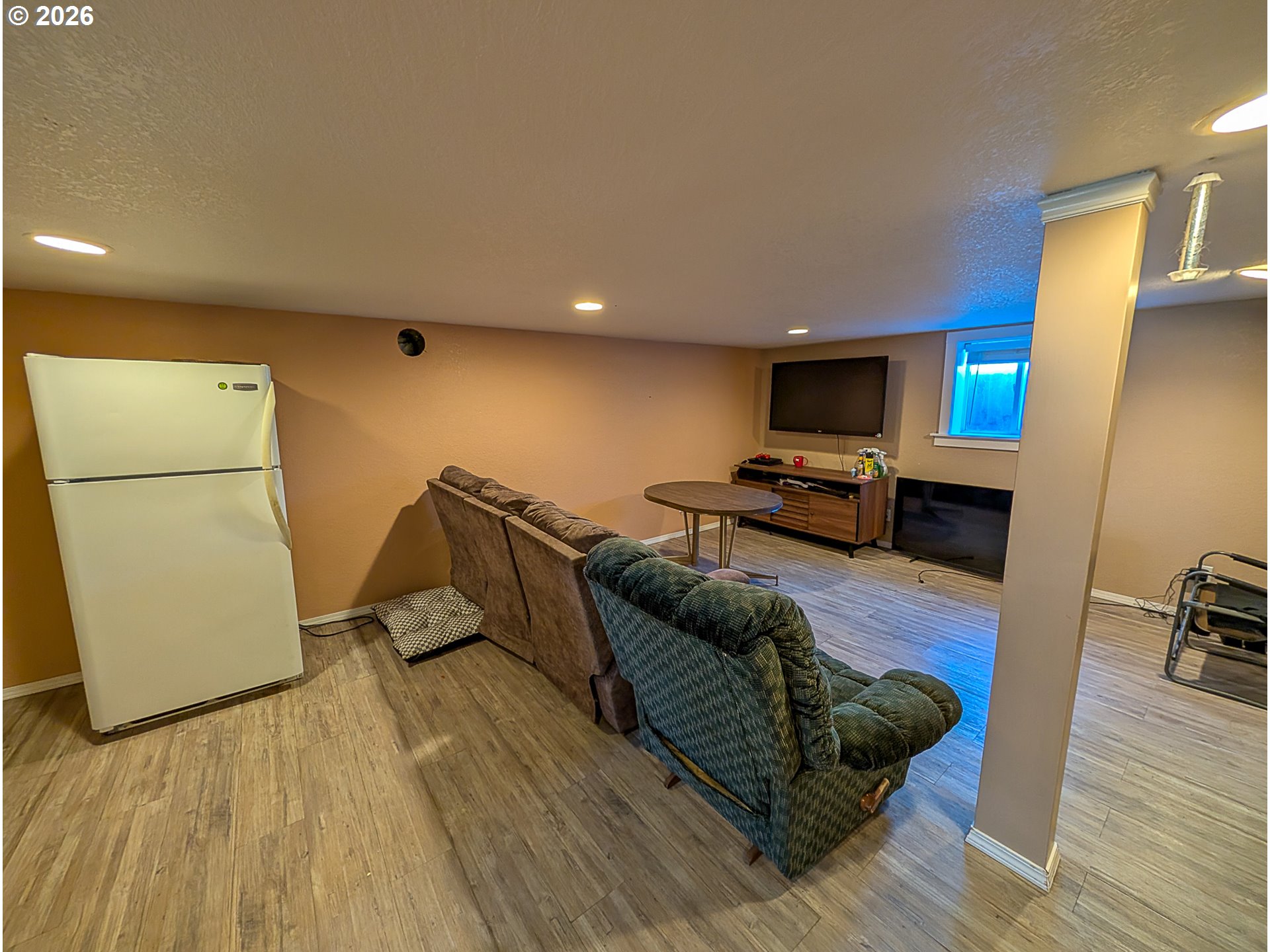 2802 North Spruce Street La Grande, OR 97850 - Photo 13 of 26 a living room with furniture and a flat screen tv