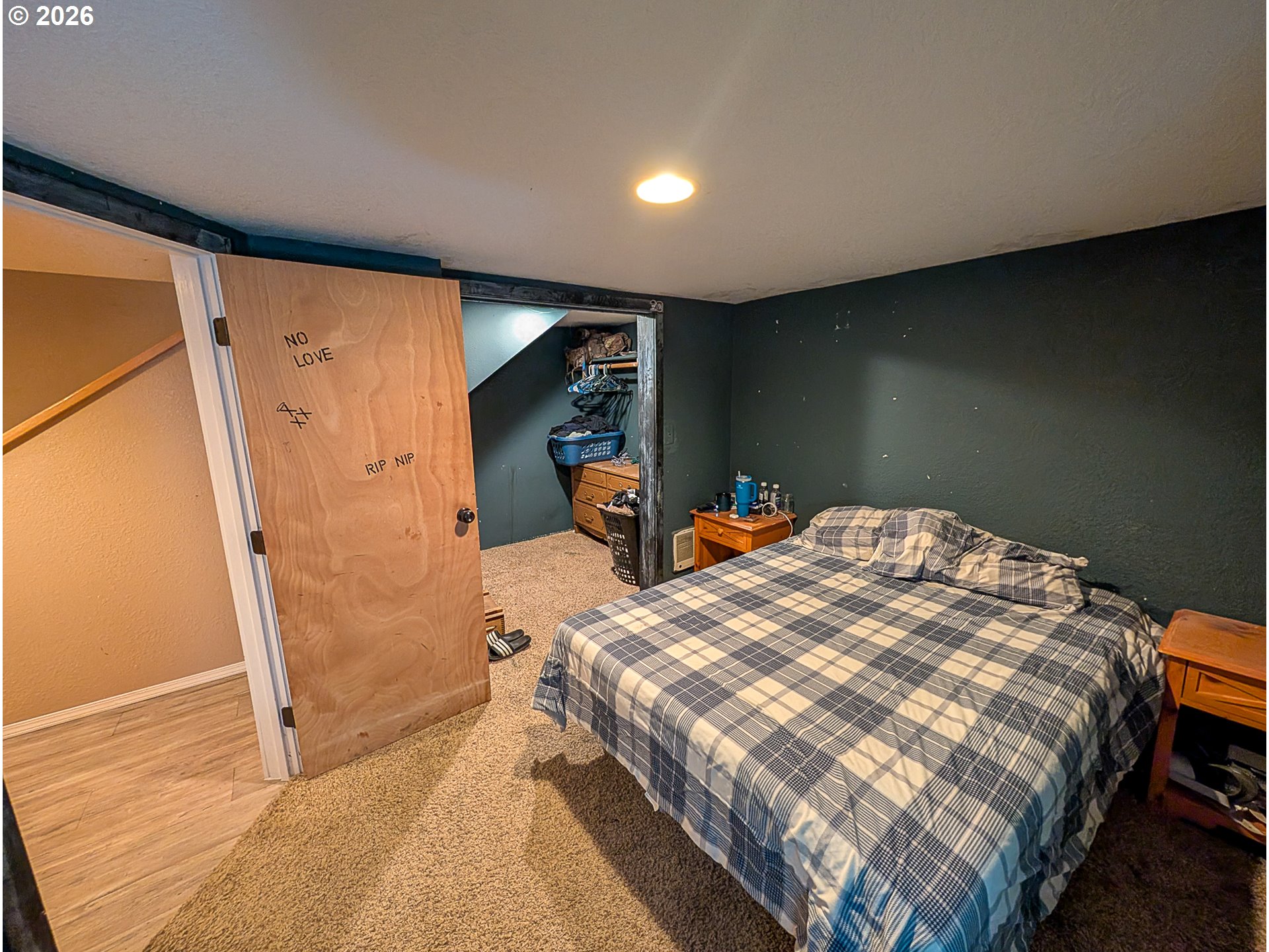 2802 North Spruce Street La Grande, OR 97850 - Photo 14 of 26 a bed room with a bed and a window