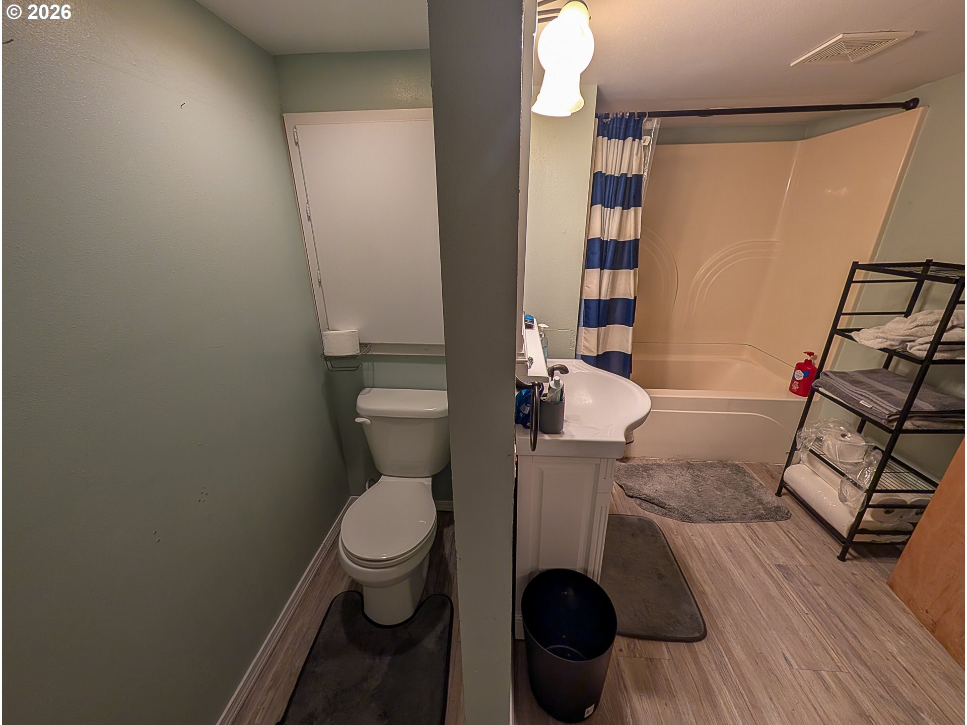 2802 North Spruce Street La Grande, OR 97850 - Photo 17 of 26 a bathroom with a toilet and a sink