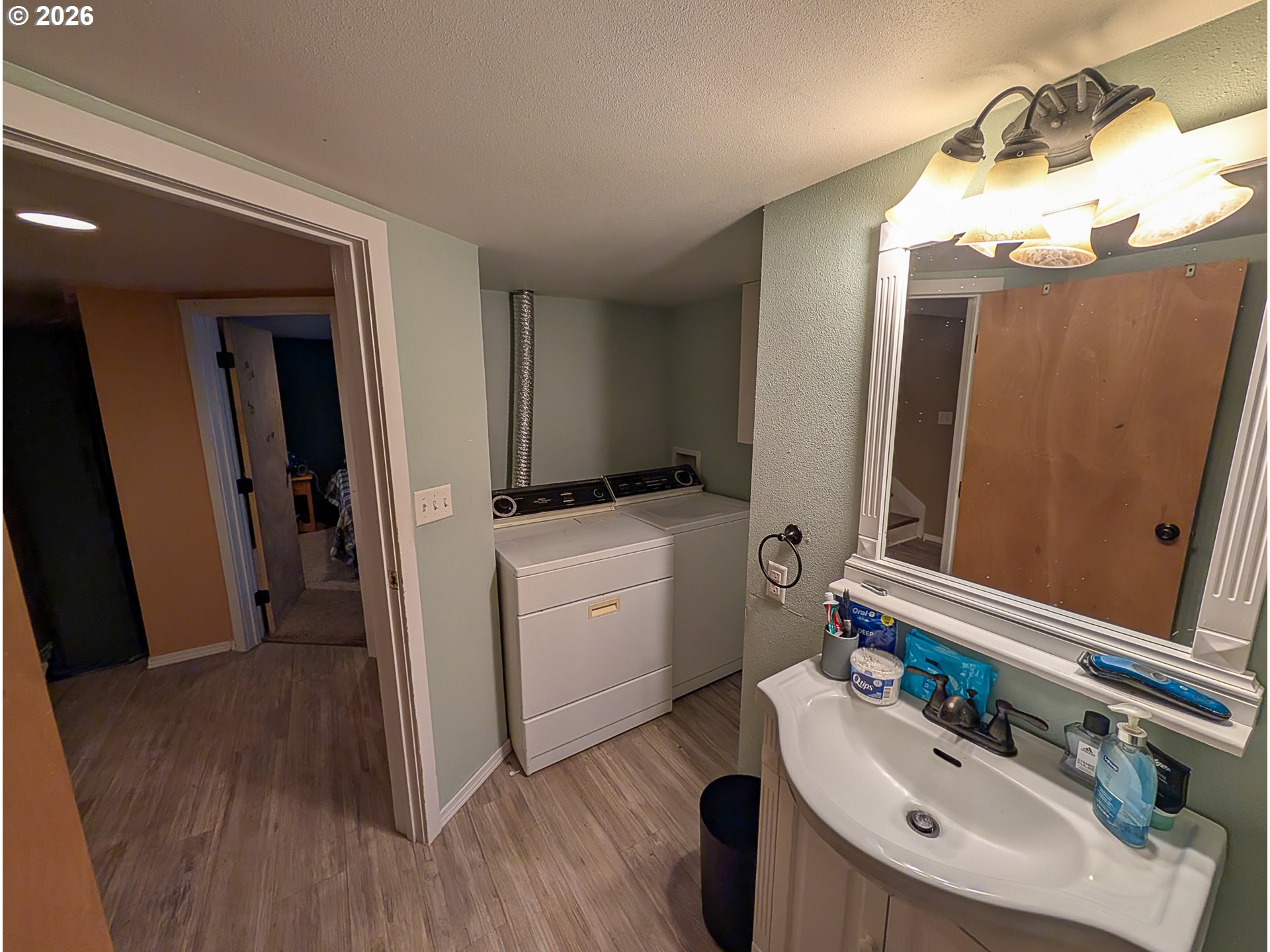 2802 North Spruce Street La Grande, OR 97850 - Photo 18 of 26 a bathroom with a sink and a mirror