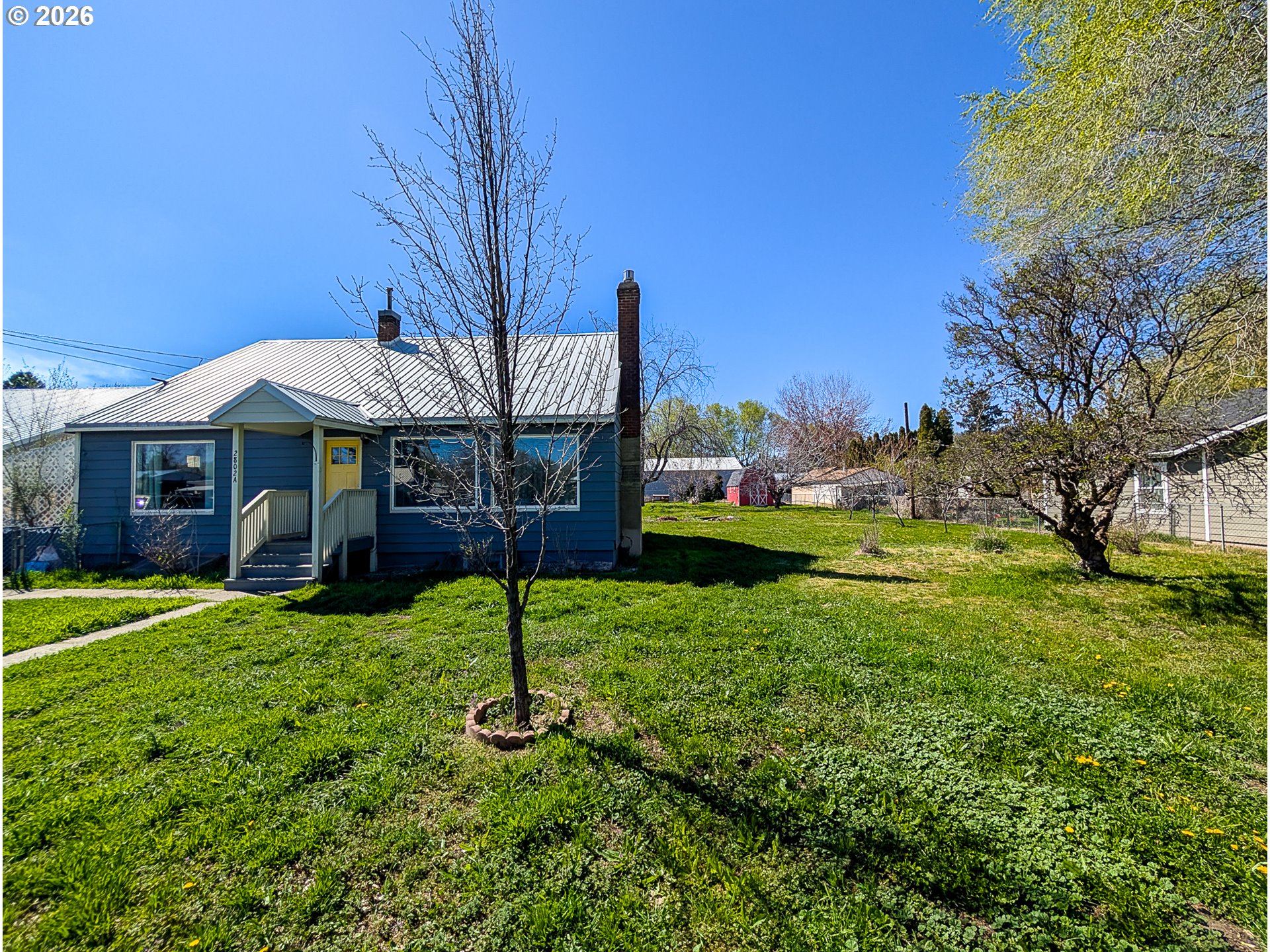 2802 North Spruce Street La Grande, OR 97850 - Photo 2 of 26 a view of a house with backyard