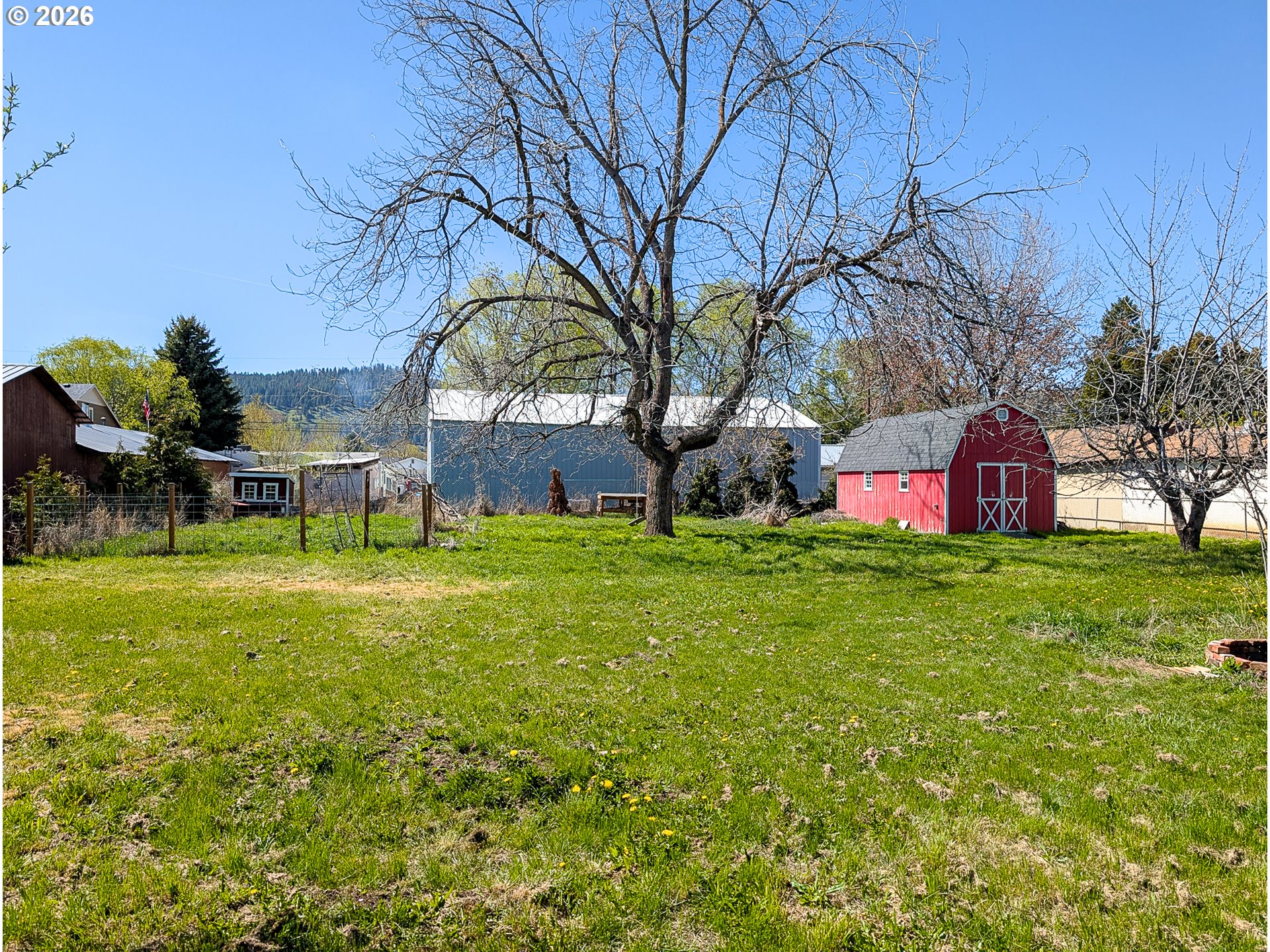 2802 North Spruce Street La Grande, OR 97850 - Photo 21 of 26 a view of yard with swimming pool and green space