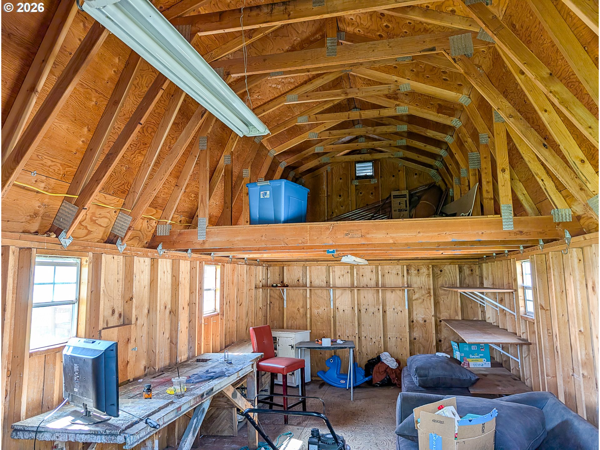 2802 North Spruce Street La Grande, OR 97850 - Photo 23 of 26 a view of a patio with table and chairs and potted plants