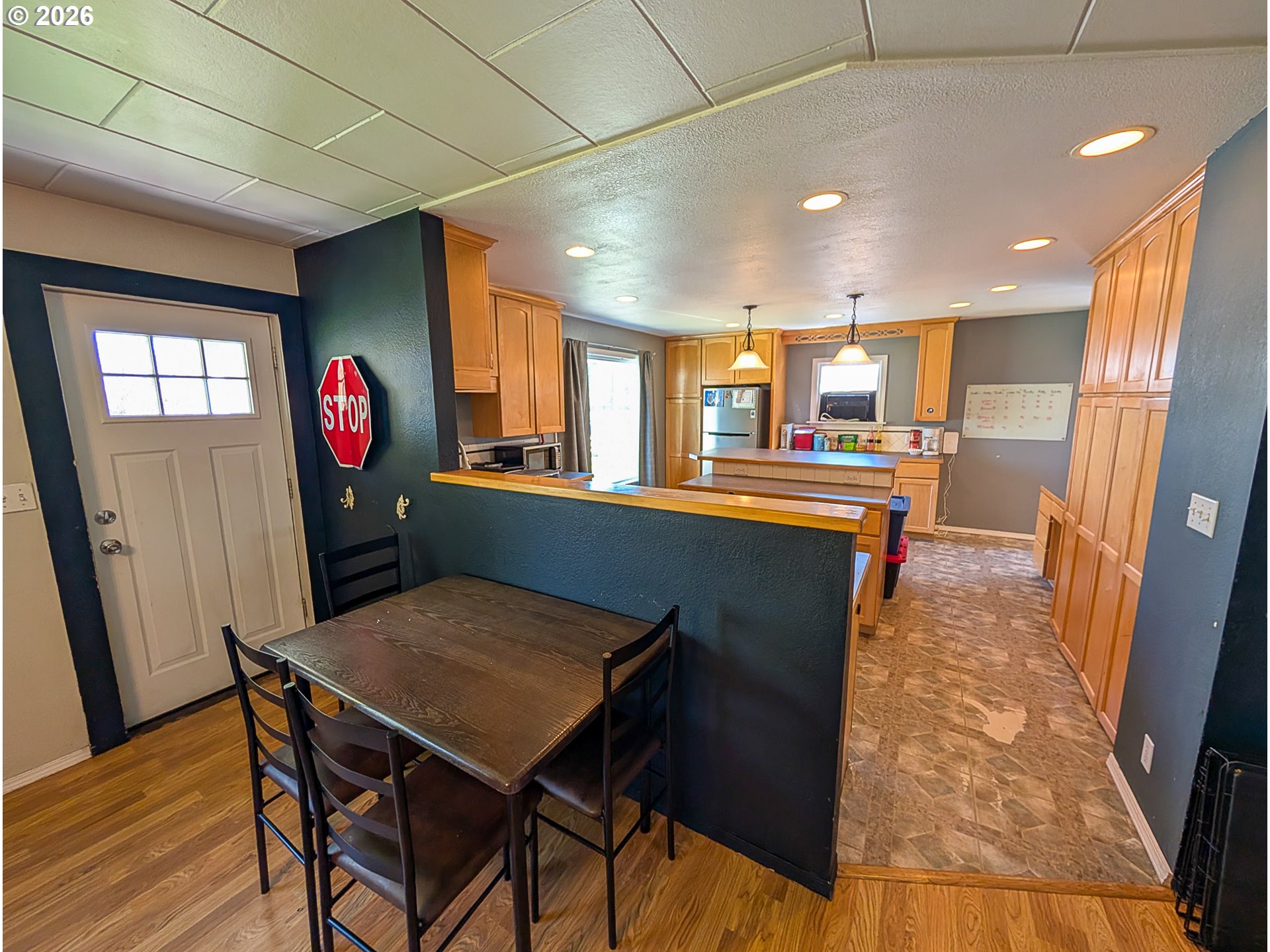 2802 North Spruce Street La Grande, OR 97850 - Photo 4 of 26 a view of a dining room with furniture window and wooden floor