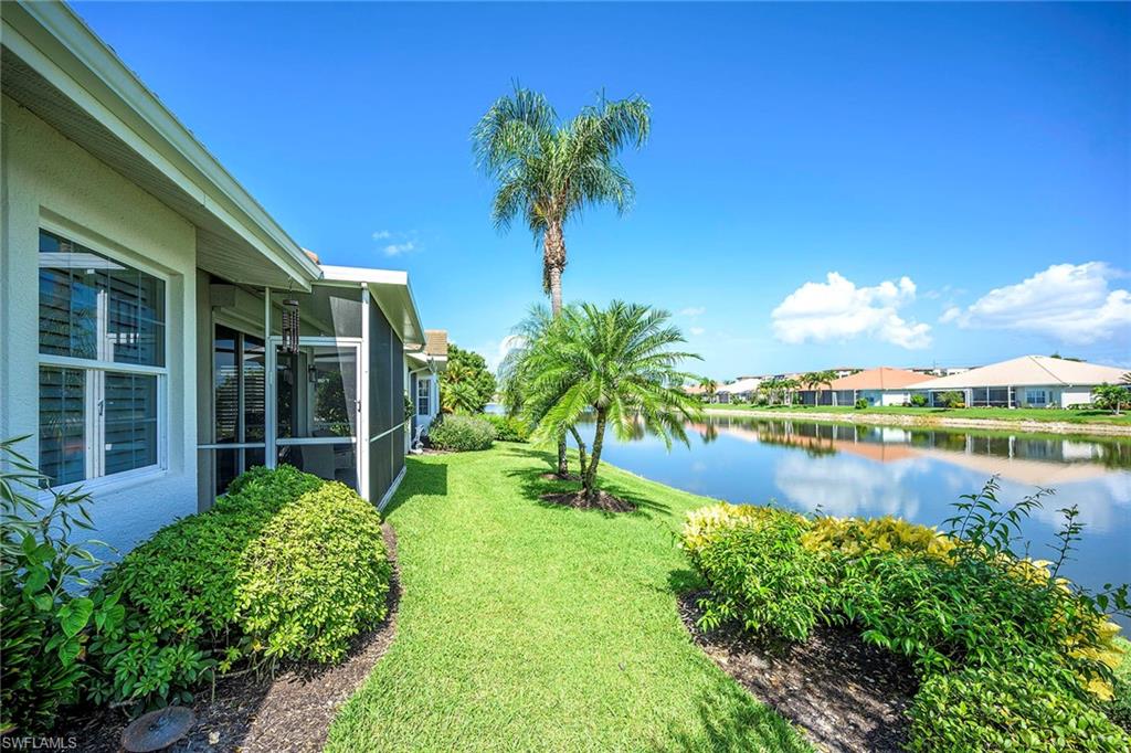 6533 Ilex Circle Naples, FL 34109 - Photo 5 of 34 a view of a garden with a lake view