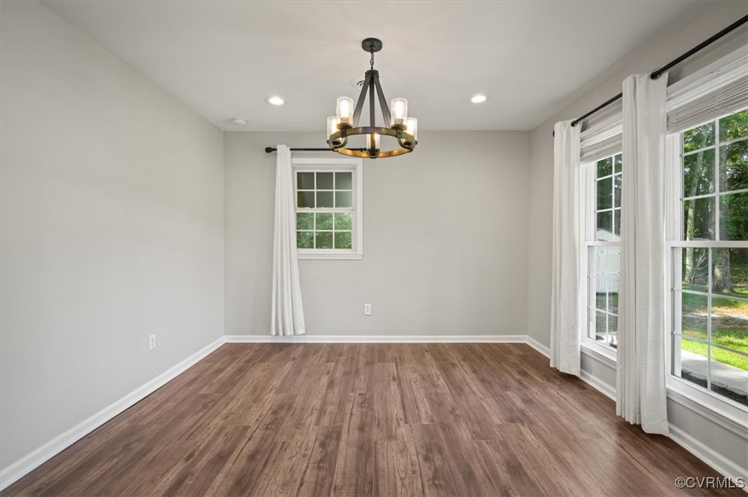 4600 Cool Hill Road Providence Forge, VA 23140 - Photo 5 of 23 an empty room with wooden floor and windows