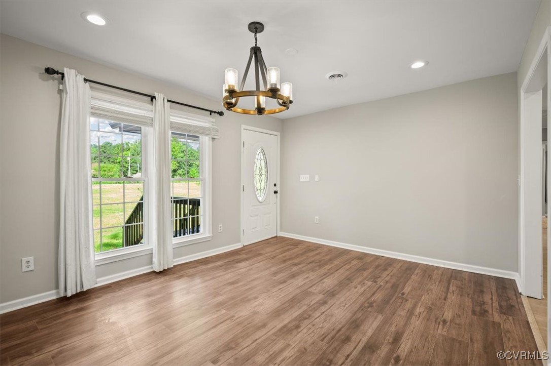 4600 Cool Hill Road Providence Forge, VA 23140 - Photo 6 of 23 a view of empty room with wooden floor and fan