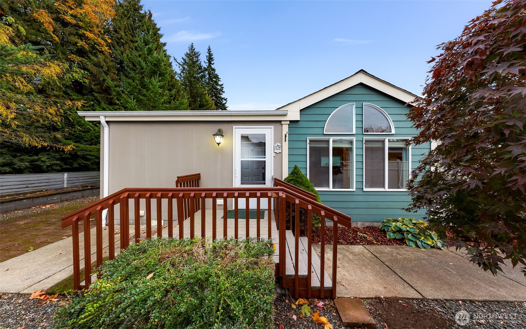 6350 Portal Way, Unit 48 Ferndale, WA 98248 - Photo 2 of 37 a front view of a house with garden