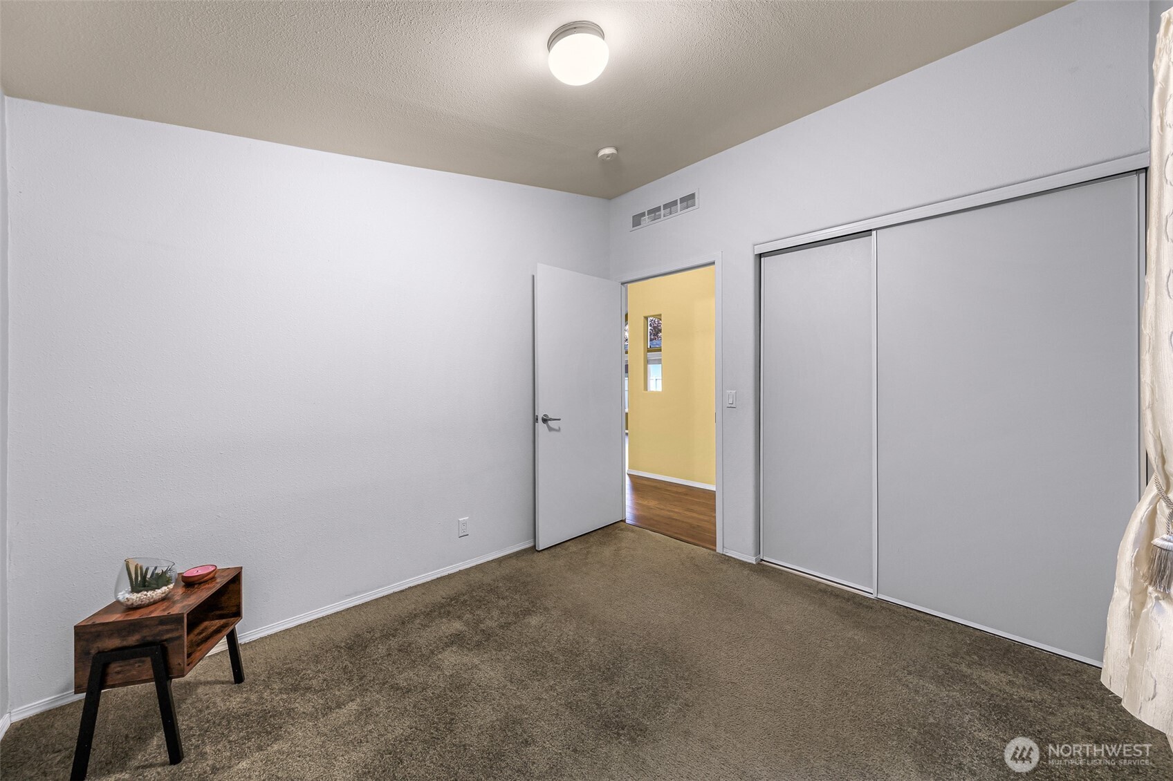 6350 Portal Way, Unit 48 Ferndale, WA 98248 - Photo 25 of 37 a view of a room with a window and a bathroom