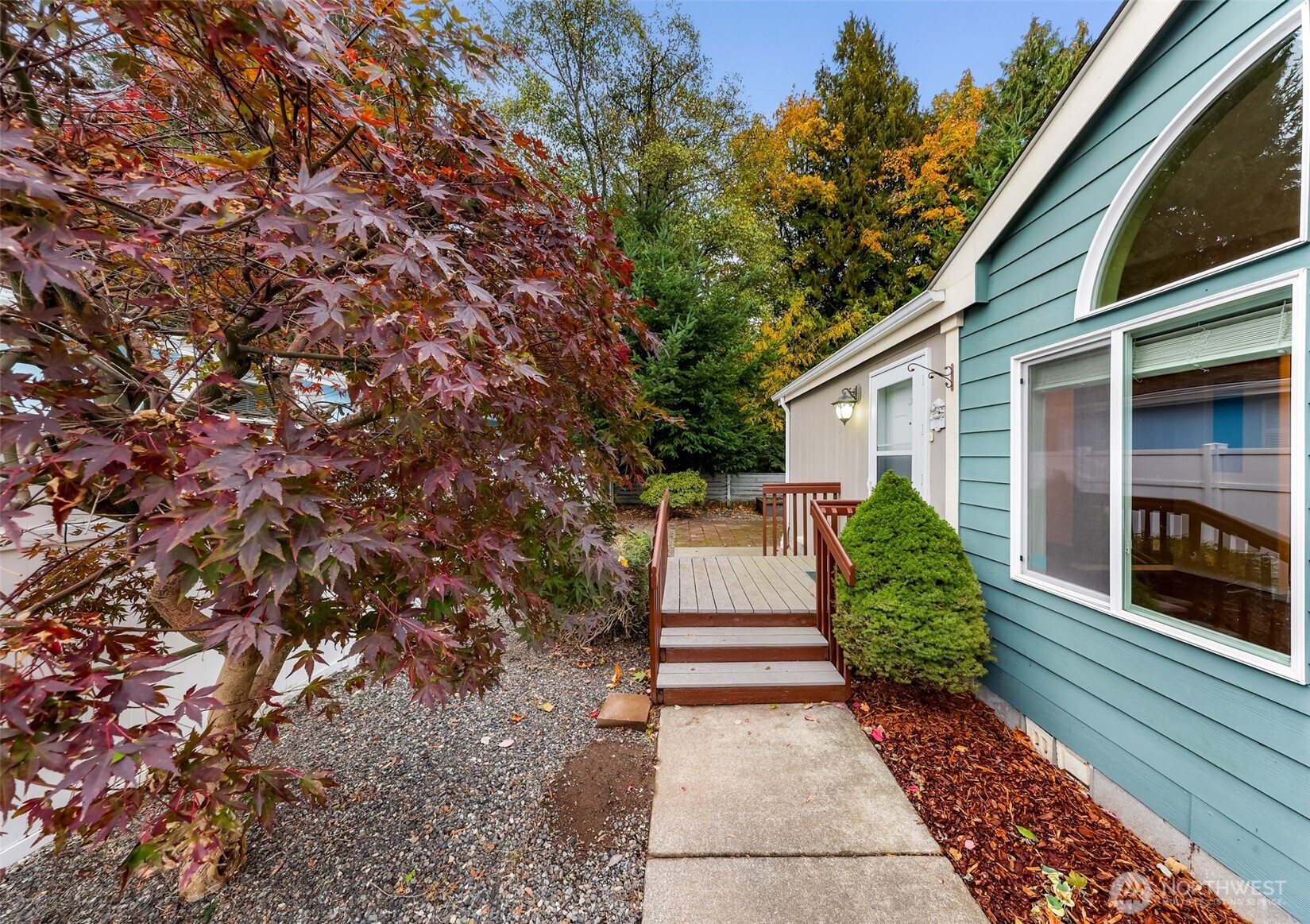 6350 Portal Way, Unit 48 Ferndale, WA 98248 - Photo 30 of 37 a front view of a house with a yard