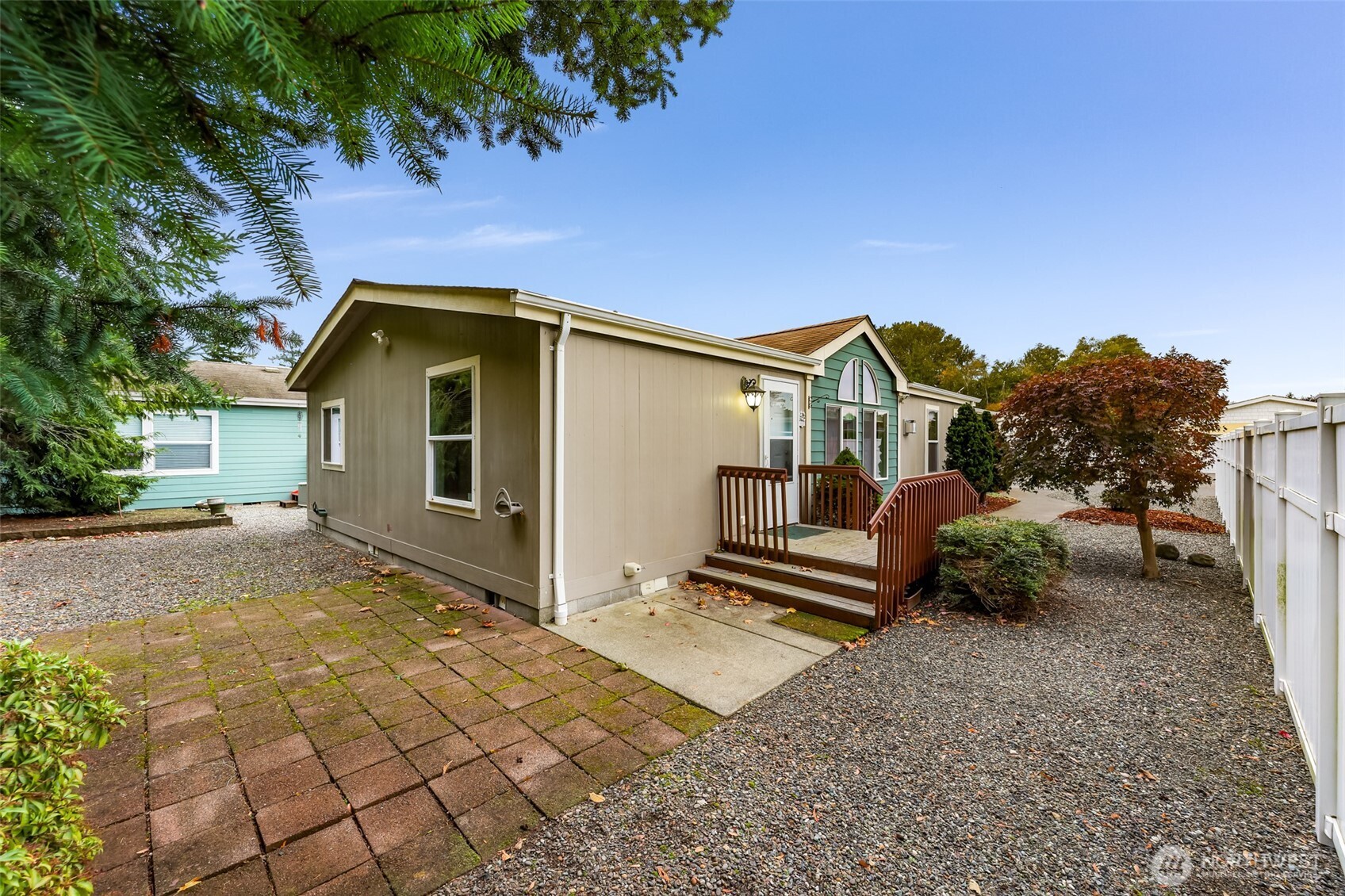 6350 Portal Way, Unit 48 Ferndale, WA 98248 - Photo 31 of 37 a front view of a house with a yard