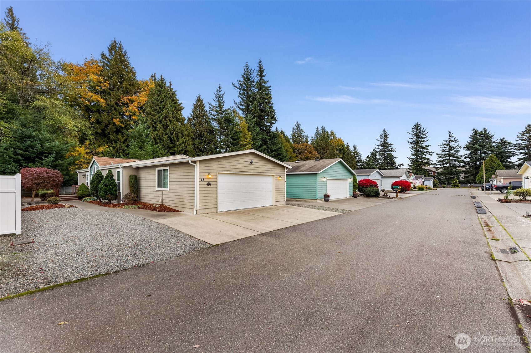 6350 Portal Way, Unit 48 Ferndale, WA 98248 - Photo 35 of 37 a white house with a outdoor space