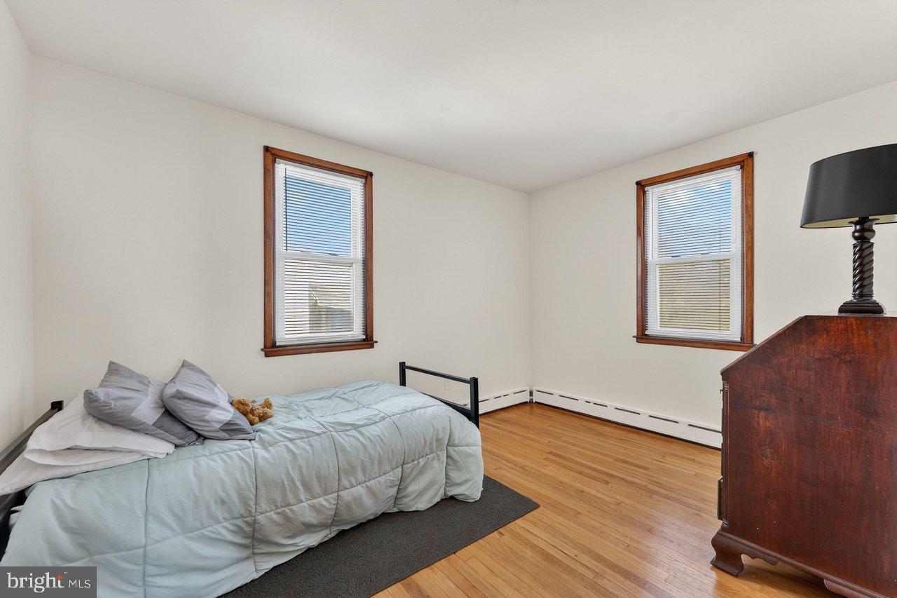 2062 Kinter Avenue Hamilton, NJ 08610 - Photo 11 of 19 a bedroom with a bed and window