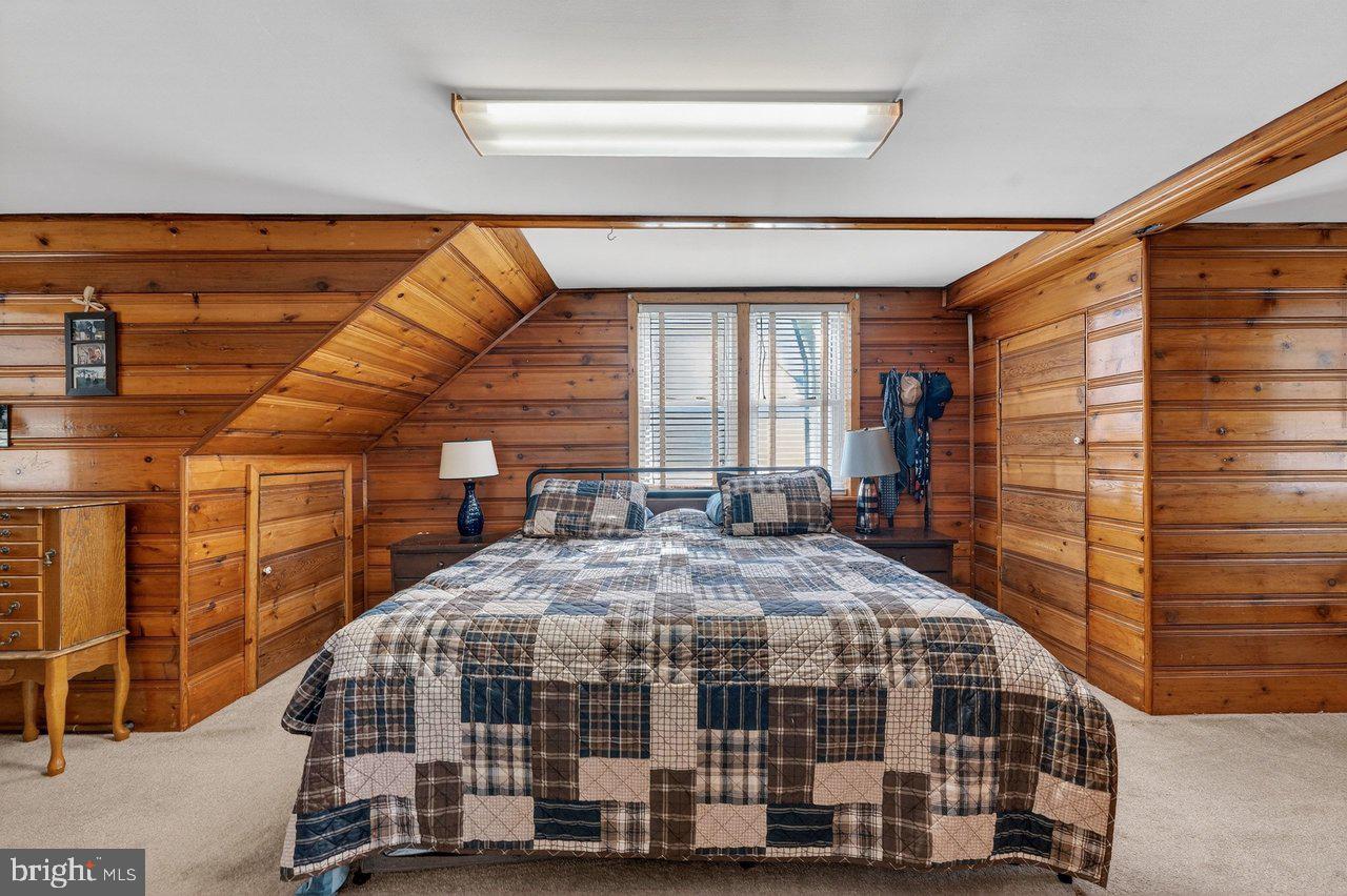 2062 Kinter Avenue Hamilton, NJ 08610 - Photo 13 of 19 a bedroom with bed and a large window