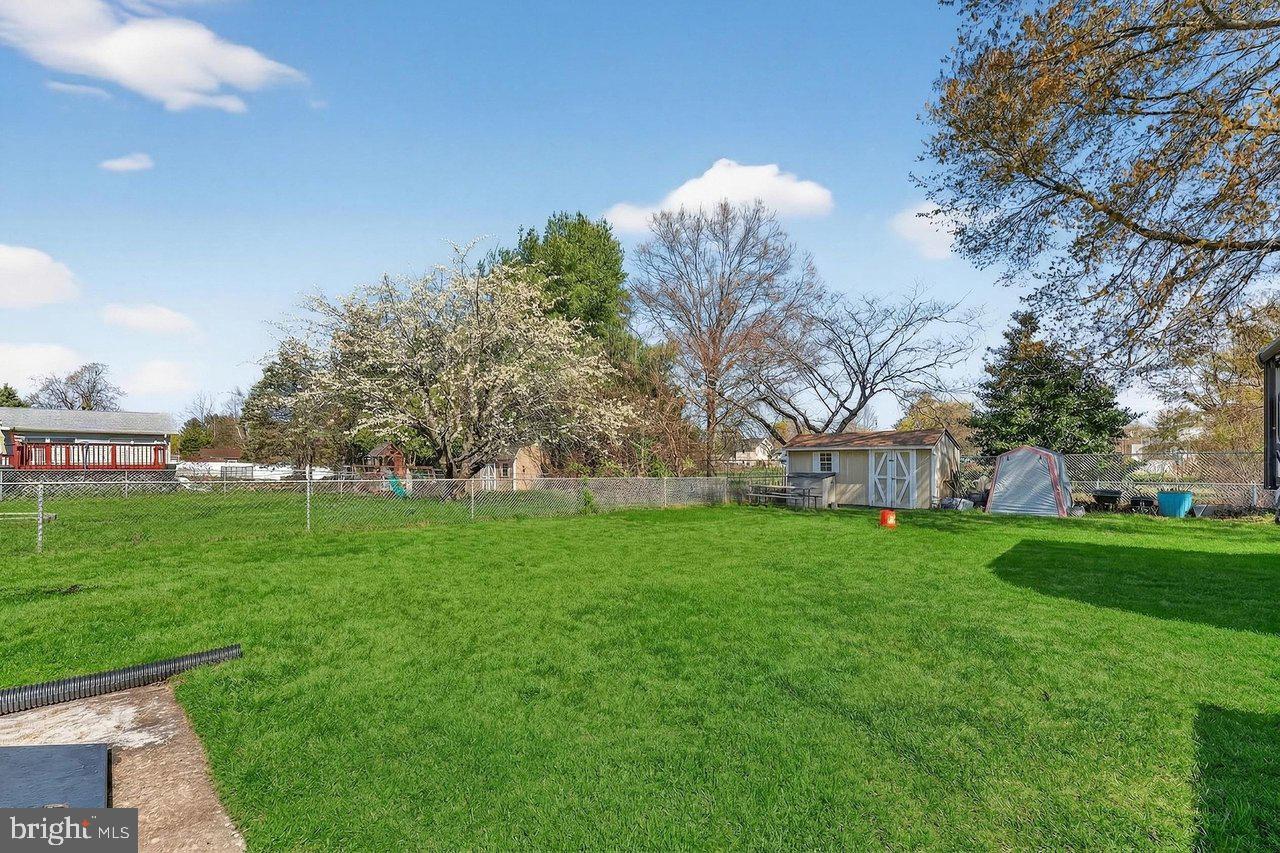 2062 Kinter Avenue Hamilton, NJ 08610 - Photo 19 of 19 a view of a field of grass and trees
