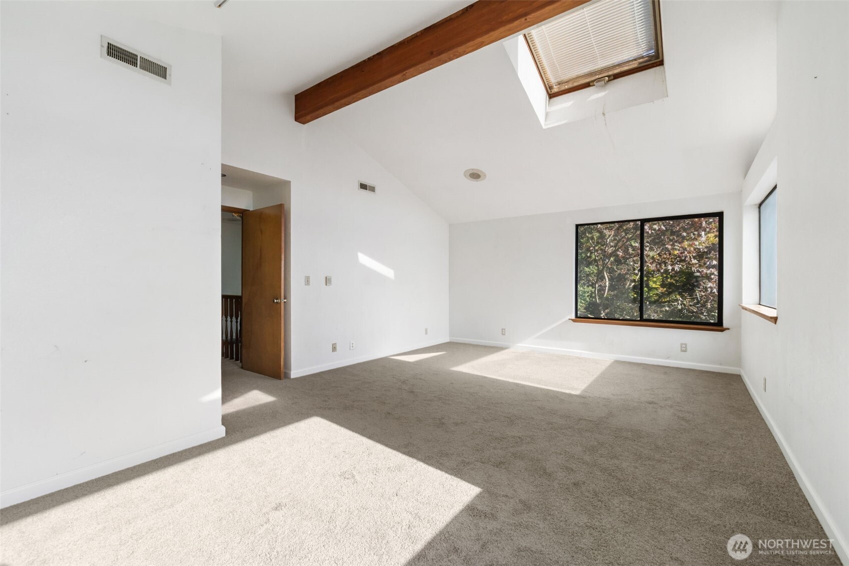 7150 Northeast North Shore Road Belfair, WA 98528 - Photo 22 of 32 an empty room with windows