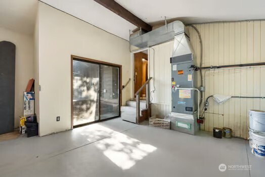 7150 Northeast North Shore Road Belfair, WA 98528 - Photo 31 of 32 an empty room with windows