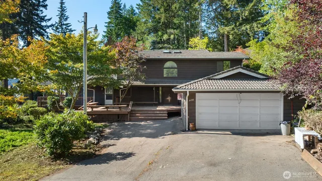 a view of a house with a garage