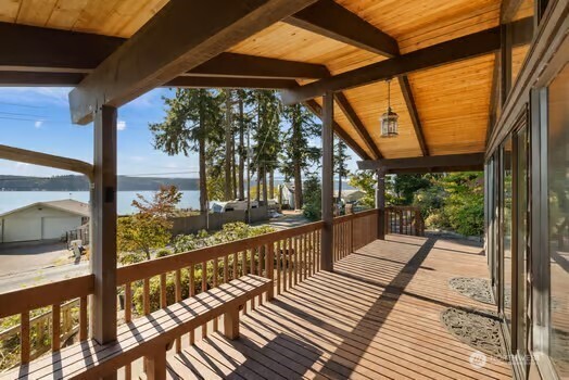 7150 Northeast North Shore Road Belfair, WA 98528 - Photo 8 of 32 a view of balcony with wooden floor